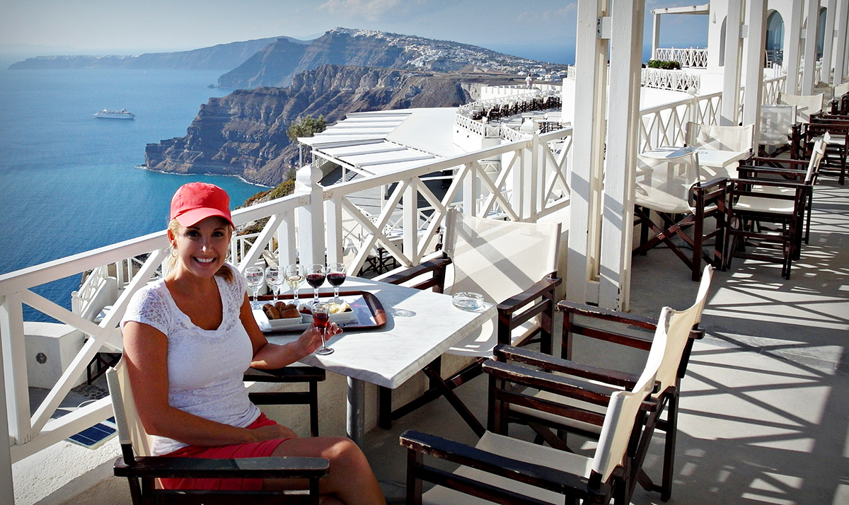 Relaxing with food and wine along the coast of Greece.