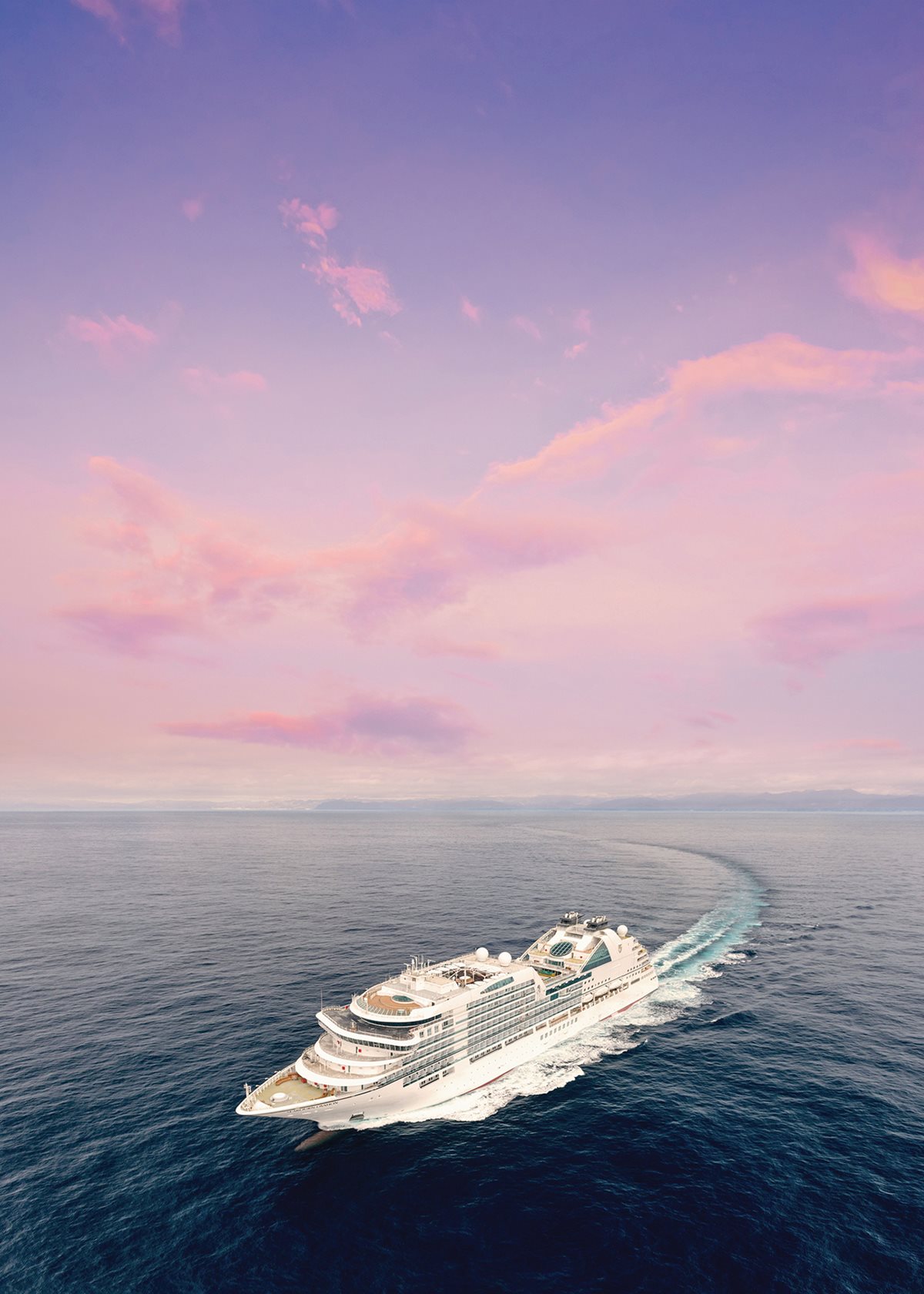 Each Seabourn vessel, including <em>Seabourn Ovation </em>(pictured here), feature dining by chef Thomas Keller and sustainable shore excursions created in partnership with UNESCO World Heritage sights.